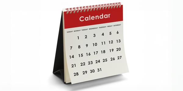a red and white desk calendar