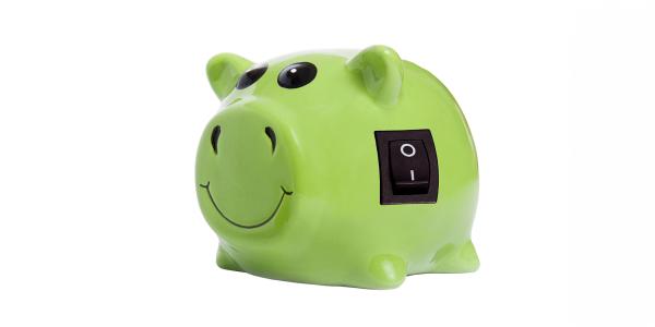 A green piggy bank with an ON/OFF switch