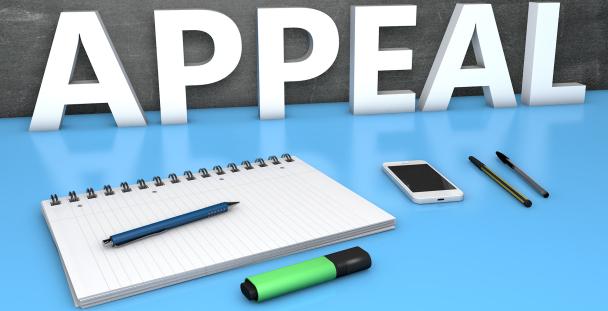 Image of desk stationery and the word appeal Image of desk stationery and the word appeal
