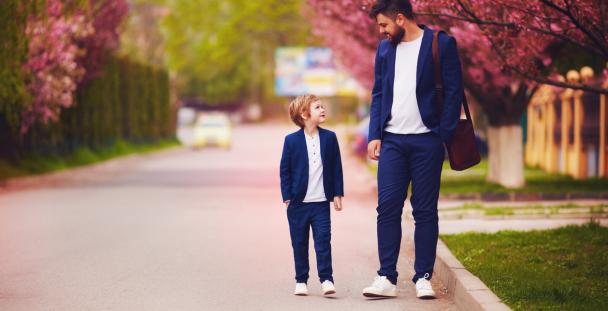 Building families through surrogacy – a new law child and man dressed the same