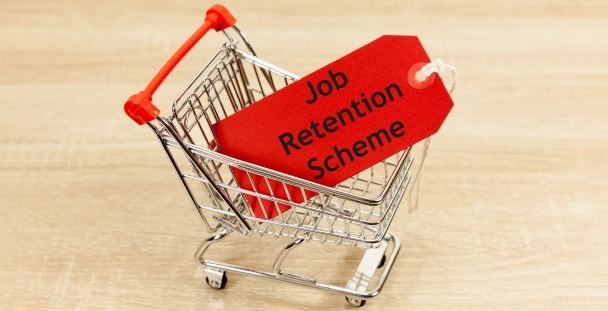 Image of miniature shopping trolley with a job retention scheme tag inside Image of miniature shopping trolley with a job retention scheme tag inside