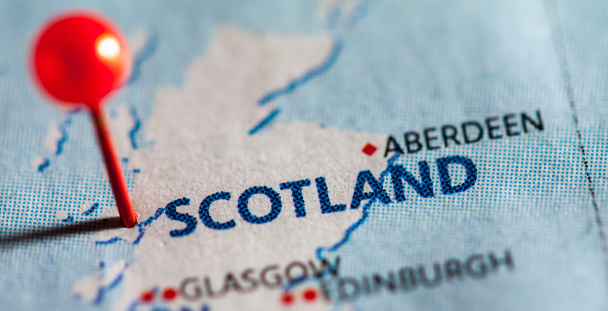 Image of Scotland on a map with a pin next to it Image of Scotland on a map with a pin next to it
