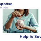 image of a woman putting savings into her piggy bank