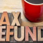Image of the words tax refund and a mug of coffee