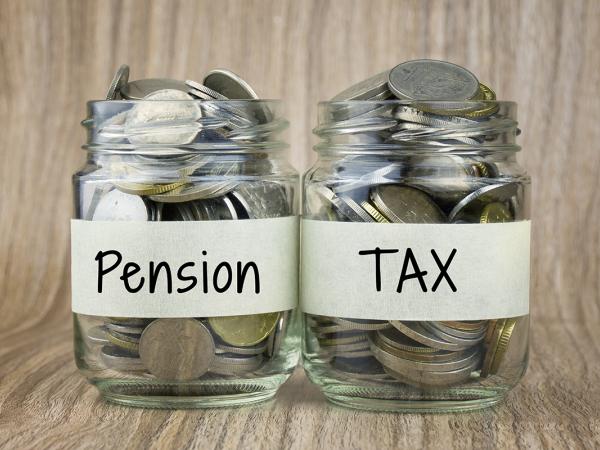 2 jars containing coins one has a label saying 'PENSION' the other has a label saying 'TAX' 