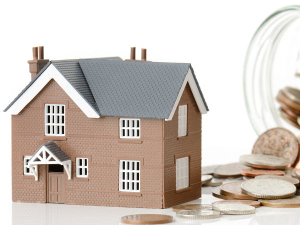 a family home next to a large jar of coins spilling out, signifying the cost of living