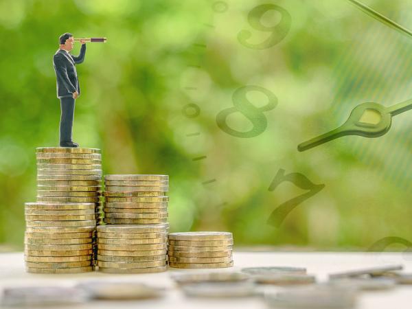 tiny man standing on a stack of coins looking through a telescope at a translucent clock