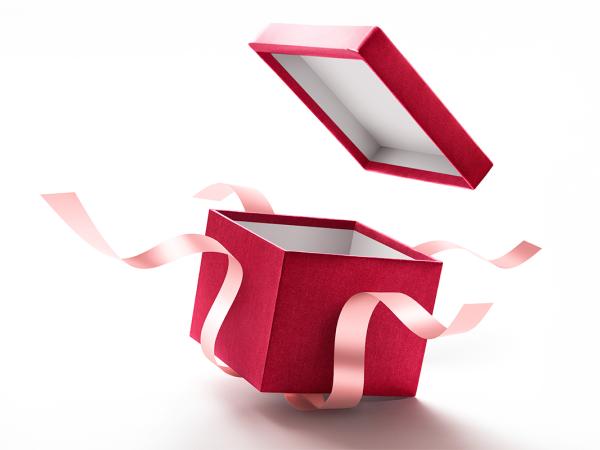 a n open red gift box with pink ribbon on a white background.
