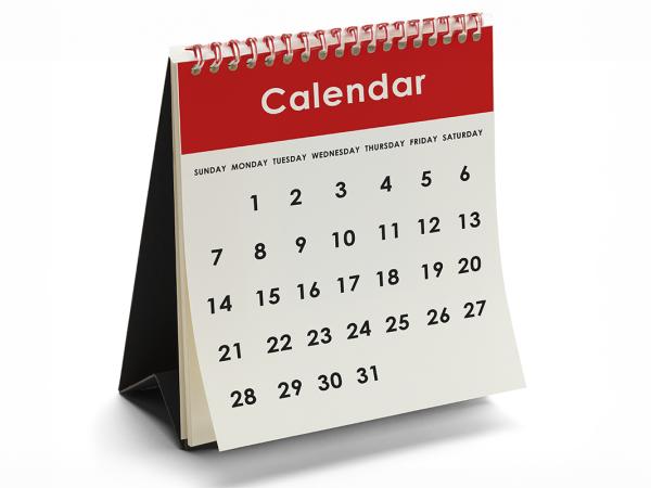 a red and white desk calendar