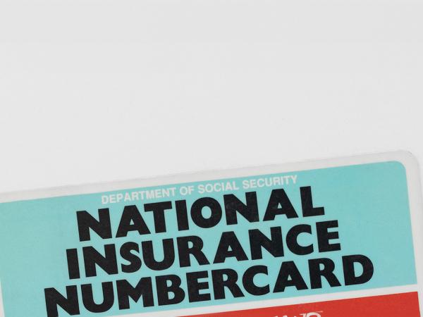 a national insurance numbercard against a white background. 