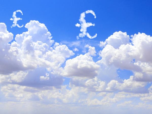 a blue sky with white fluffy clouds, some clouds formed like a pound sign