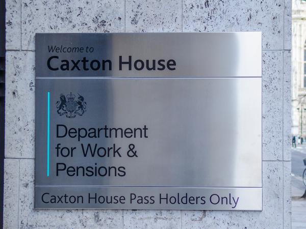 sign for the DWP building in the UK, the sign reads 'WELCOME TO CAXTON HOUSE DEPARTMENT FOR WORK & PENSIONS' 