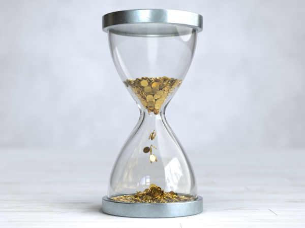 An hourglass but instead of being filled with sand it is filled with golden coins. 