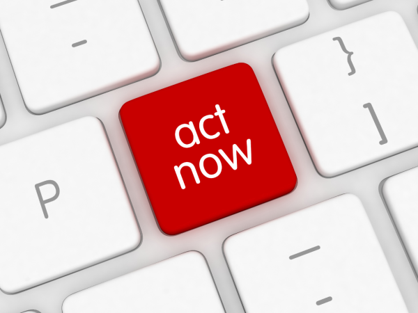 Keyboard with a red key that reads 'ACT NOW'. 