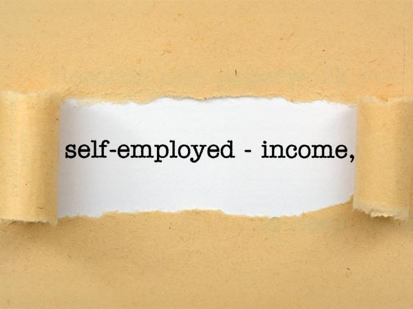 Brown paper with a tear in the centre, through the tear you can see a white background with the words 'SELF EMPLOYED - INCOME' in black text.