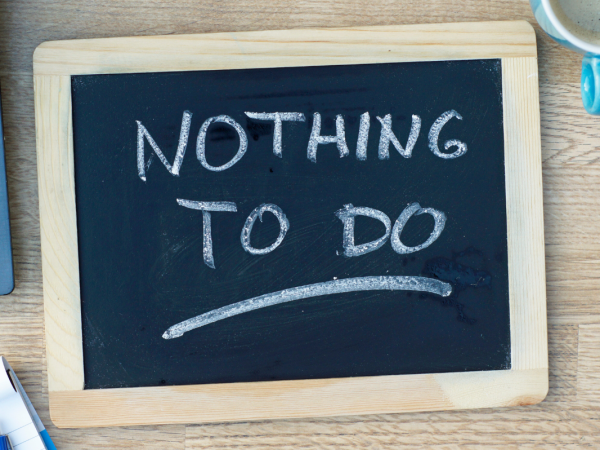 Chalk board with the words 'NOTHING TO DO' written in white chalk. 