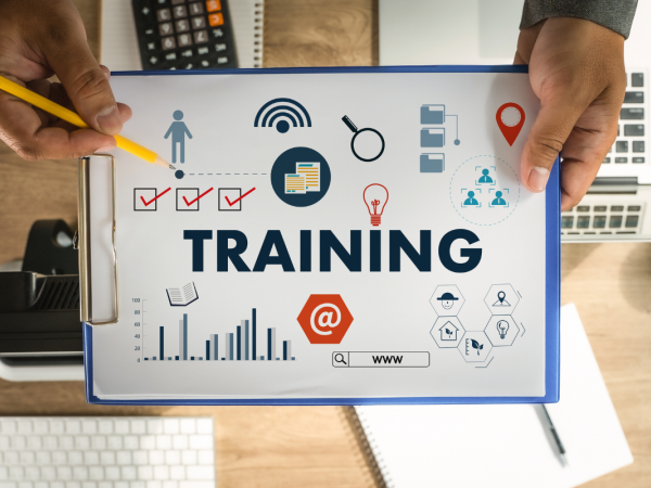 a clipboard with the word 'TRAINING' and lots of graphs 