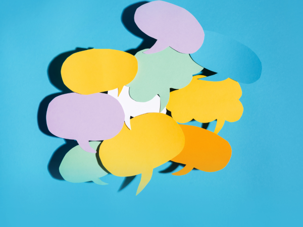 Various speech and thought bubbles on different coloured paper cut out and bundled together Various speech and thought bubbles on different coloured paper cut out and bundled together