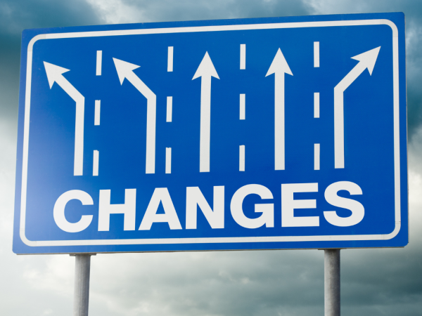 a street sign with 5 arrows pointing in different directions with the word 'CHANGES' 
