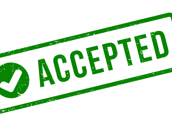 Green stamp of the word 'ACCEPTED' with a green tick