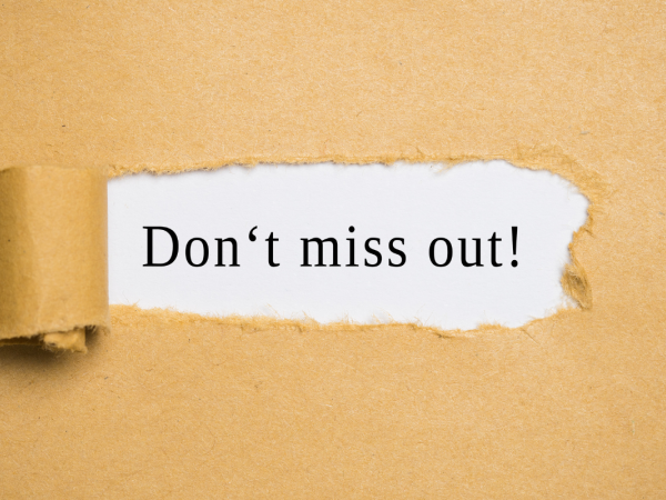 A piece of brown paper with a tear in the centre, through the tear the words 'DON'T MISS OUT!' can be seen