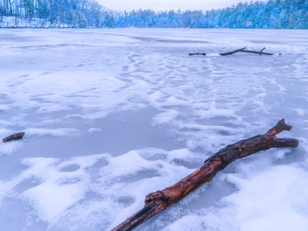 A frozen lake reaching as far as the eye can see