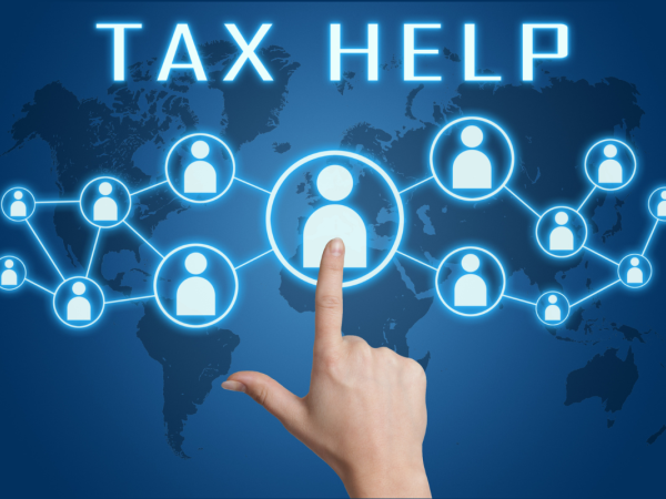 A network of people icons linked together from the central icon, above are the words 'TAX HELP' 