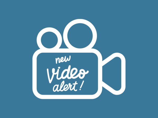 A camcorder shape outlining the words 'NEW VIDEO ALERT!'