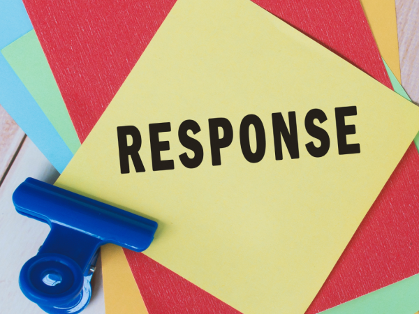 Coloured post it notes with the word 'RESPONSE' on the front one