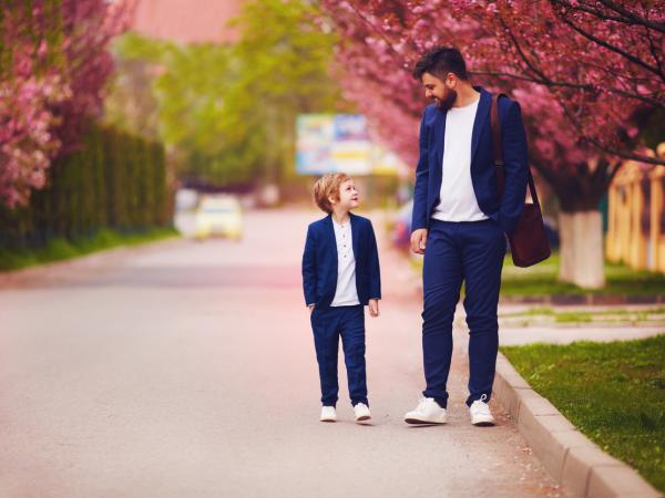 child and man dressed the same