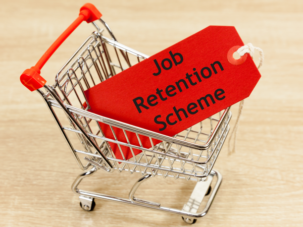 Image of a miniature shopping trolley with a job retention scheme tag inside