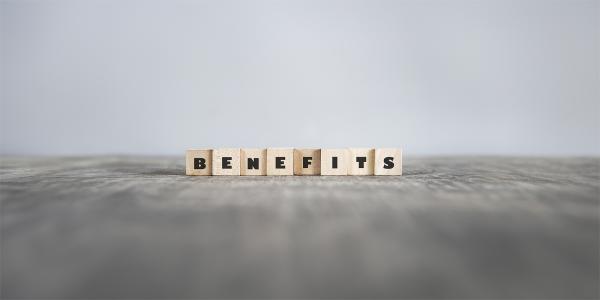 wooden scrabble tiles spelling out the word 'BENEFITS' wooden scrabble tiles spelling out the word 'BENEFITS'