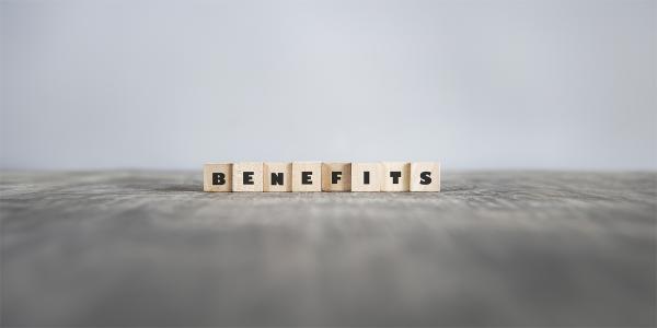 wooden scrabble tiles spelling out the word 'BENEFITS' 