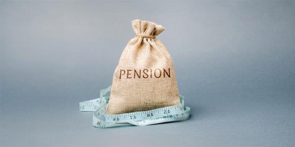 a burlap sack with the word 'PENSION' on the front, around the sack a fabric tape measure can be seen a burlap sack with the word 'PENSION' on the front, around the sack a fabric tape measure can be seen