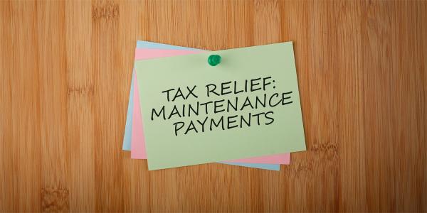a pile of post-it notes pinned to a board, the top note reads 'TAX RELIEF: MAINTENANCE PAYMENTS' a pile of post-it notes pinned to a board, the top note reads 'TAX RELIEF: MAINTENANCE PAYMENTS'