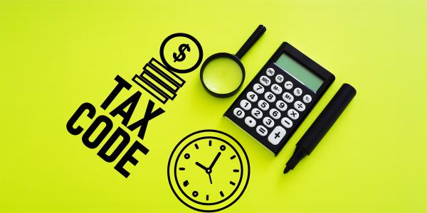 a calculator, marker pen and magnifying glass against a lime green background, drawn on the green background are the words 'TAX CODE', a stack of coins, and a clock. 