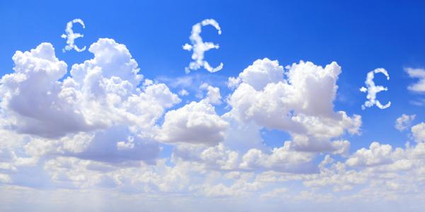 a blue sky with white fluffy clouds, some clouds formed like a pound sign