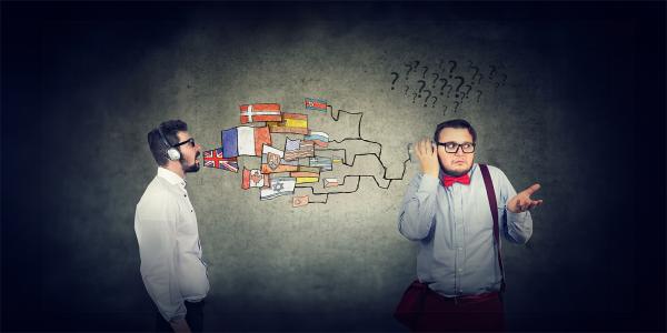 one person speaking on the left another holding a glass to his ear on the right and looking confused. drawn on the wall behind them are flags of various countries, starting with Great Britain on the left and all leading to the glass on the right. 