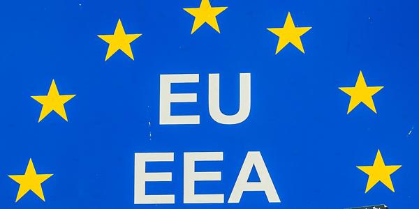 a blue background with 7 yellow stars in an arch pattern, underneath this are the words 'EU' and 'EEA' in white text a blue background with 7 yellow stars in an arch pattern, underneath this are the words 'EU' and 'EEA' in white text