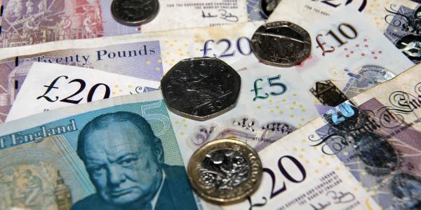 Various UK bank notes and coins. Various UK bank notes and coins.