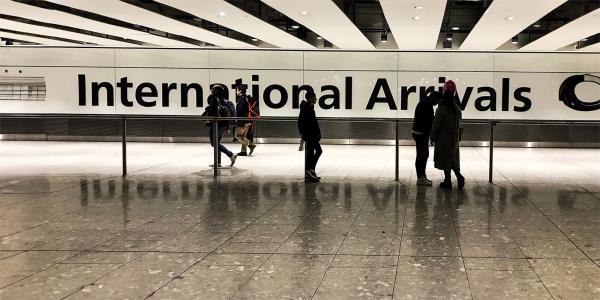 'INTERNATIONAL ARRIVALS' at a UK airport 'INTERNATIONAL ARRIVALS' at a UK airport
