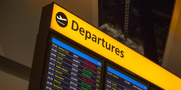 Airport screen showing 'DEPARTURES' Airport screen showing 'DEPARTURES'