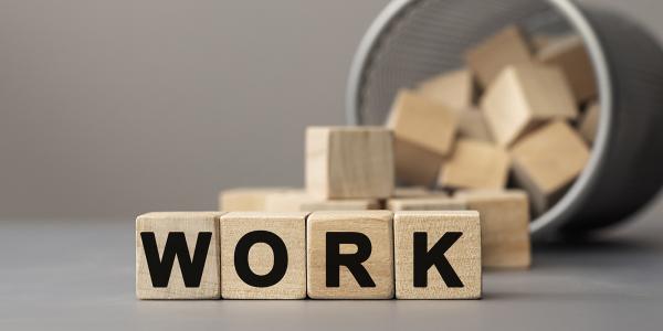 wooden blocks spelling out the word 'WORK'.