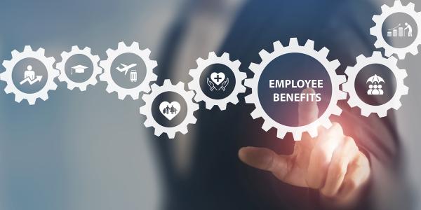 An employer pointing to a section of a hologram. the hologram shows many cogs interlinking, each with a different icon on the cog. The employer is pointing to the cog that says 'EMPLOYEE BENEFITS'. An employer pointing to a section of a hologram. the hologram shows many cogs interlinking, each with a different icon on the cog. The employer is pointing to the cog that says 'EMPLOYEE BENEFITS'.