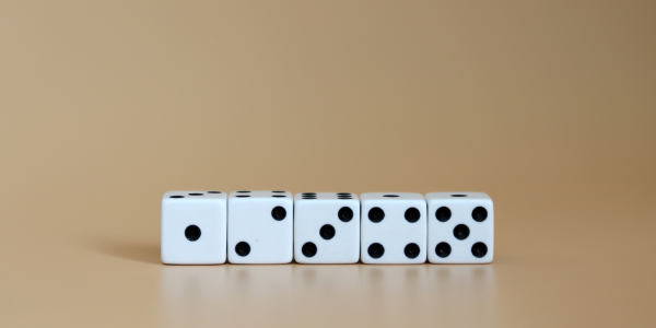 5 separate Die each showing a different number 1 to 5. 5 separate Die each showing a different number 1 to 5.