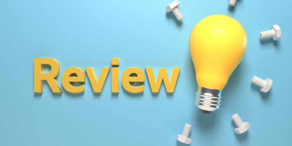 the word 'REVIEW' in yellow text next to a yellow lightbulb surrounded by screws against a blue background the word 'REVIEW' in yellow text next to a yellow lightbulb surrounded by screws against a blue background