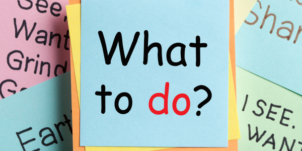 sticky notes with various writing on them, the front one saying 'WHAT TO DO?'. sticky notes with various writing on them, the front one saying 'WHAT TO DO?'.