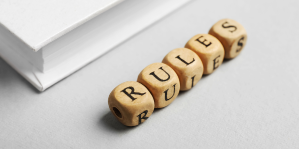 wooden blocks that spell out the word 'RULES'. wooden blocks that spell out the word 'RULES'.