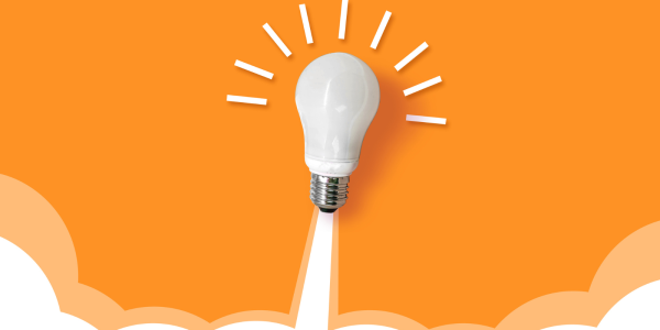 Orange background with a lightbulb launching into the air. Orange background with a lightbulb launching into the air.