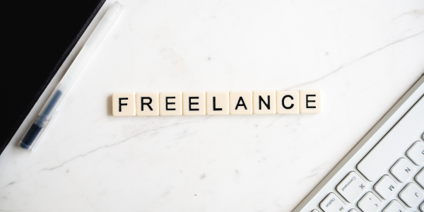 letter tiles arranged to spell out the word 'FREELANCE'. letter tiles arranged to spell out the word 'FREELANCE'.